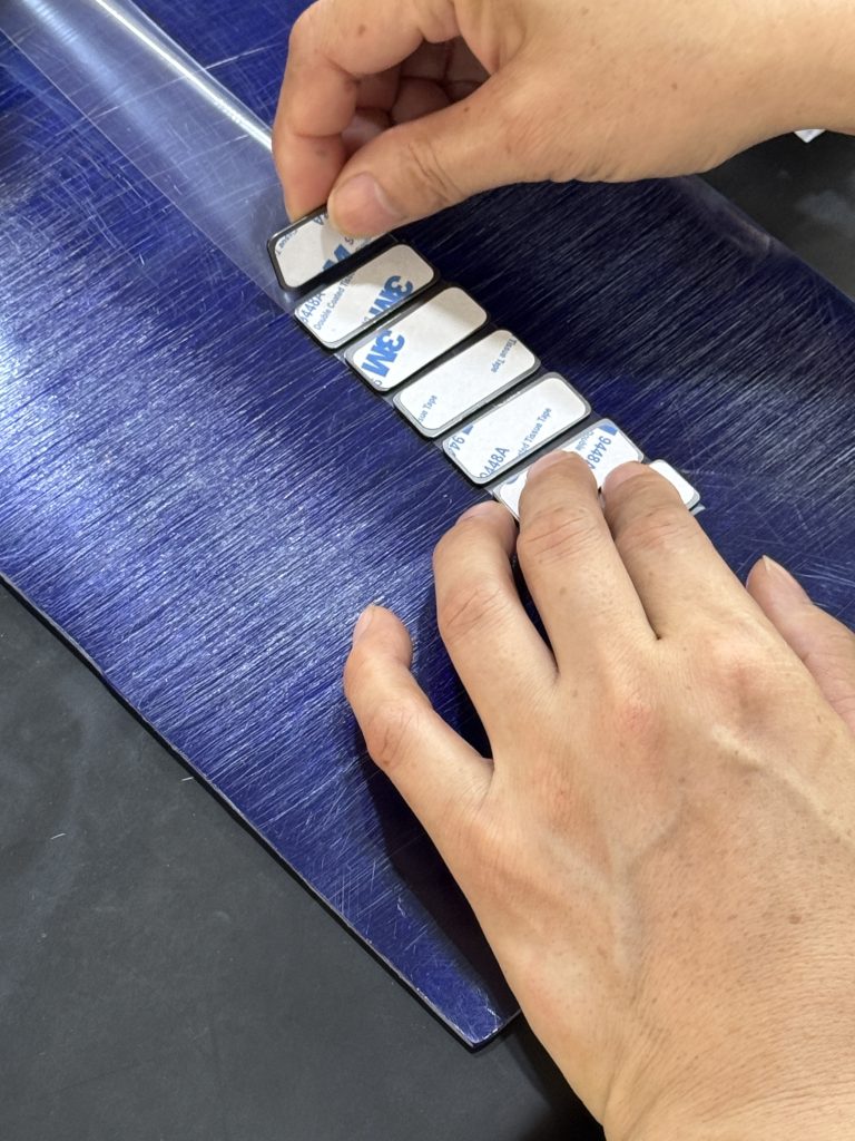 Applying a film for the custom nameplates