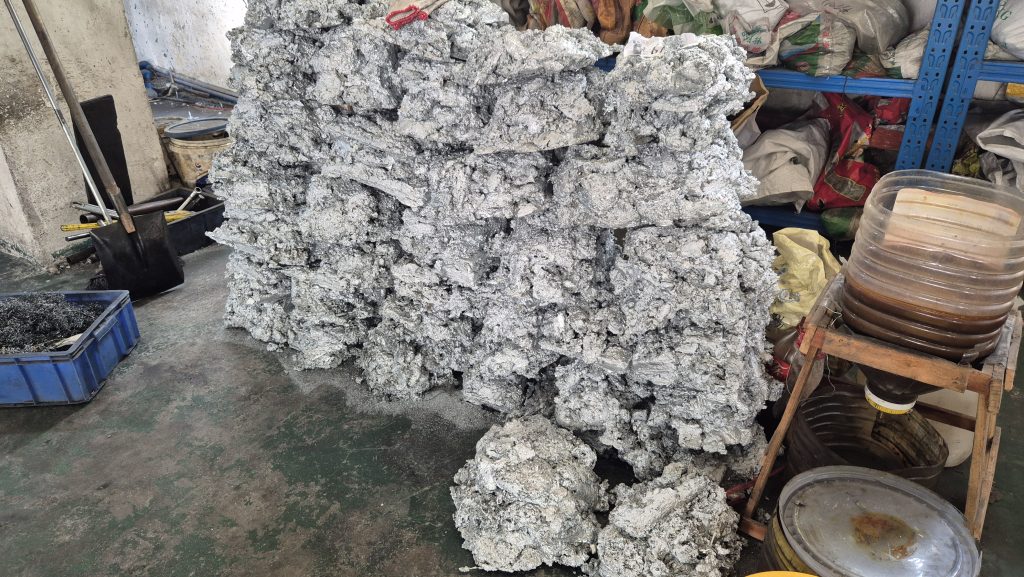 a pile of zinc alloy waste