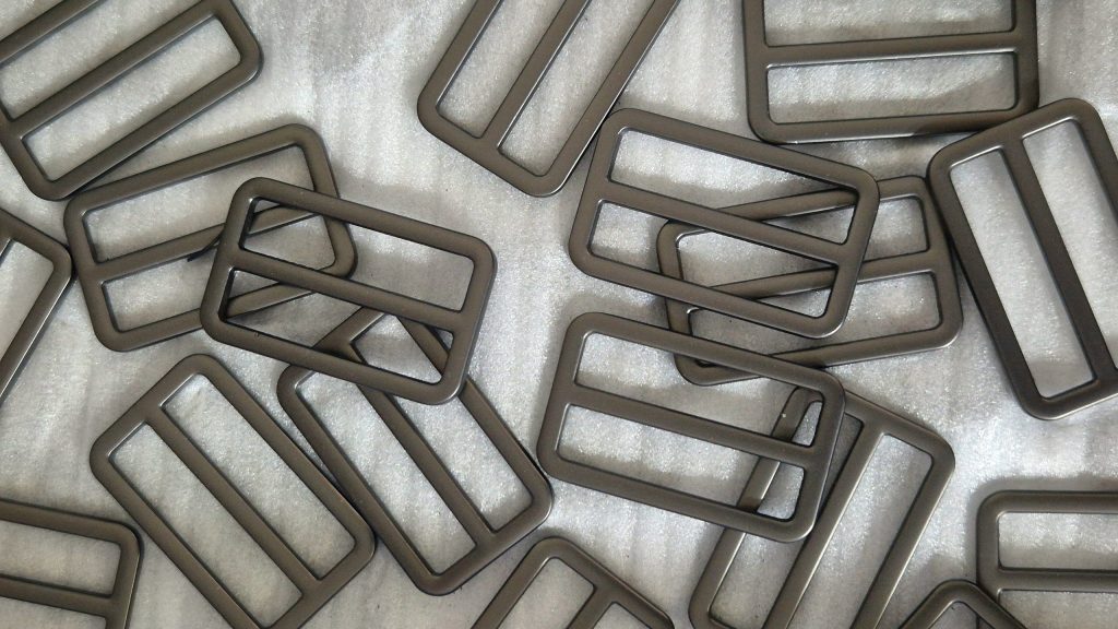 Multiple Tri-glide slides on a white surface