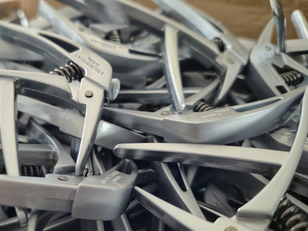 Beyond Bag Hardware: When Manufacturing Takes an Unexpected Turn – Guitar Capo